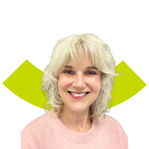 Portrait of a smiling middle aged woman with medium length light blonde hair