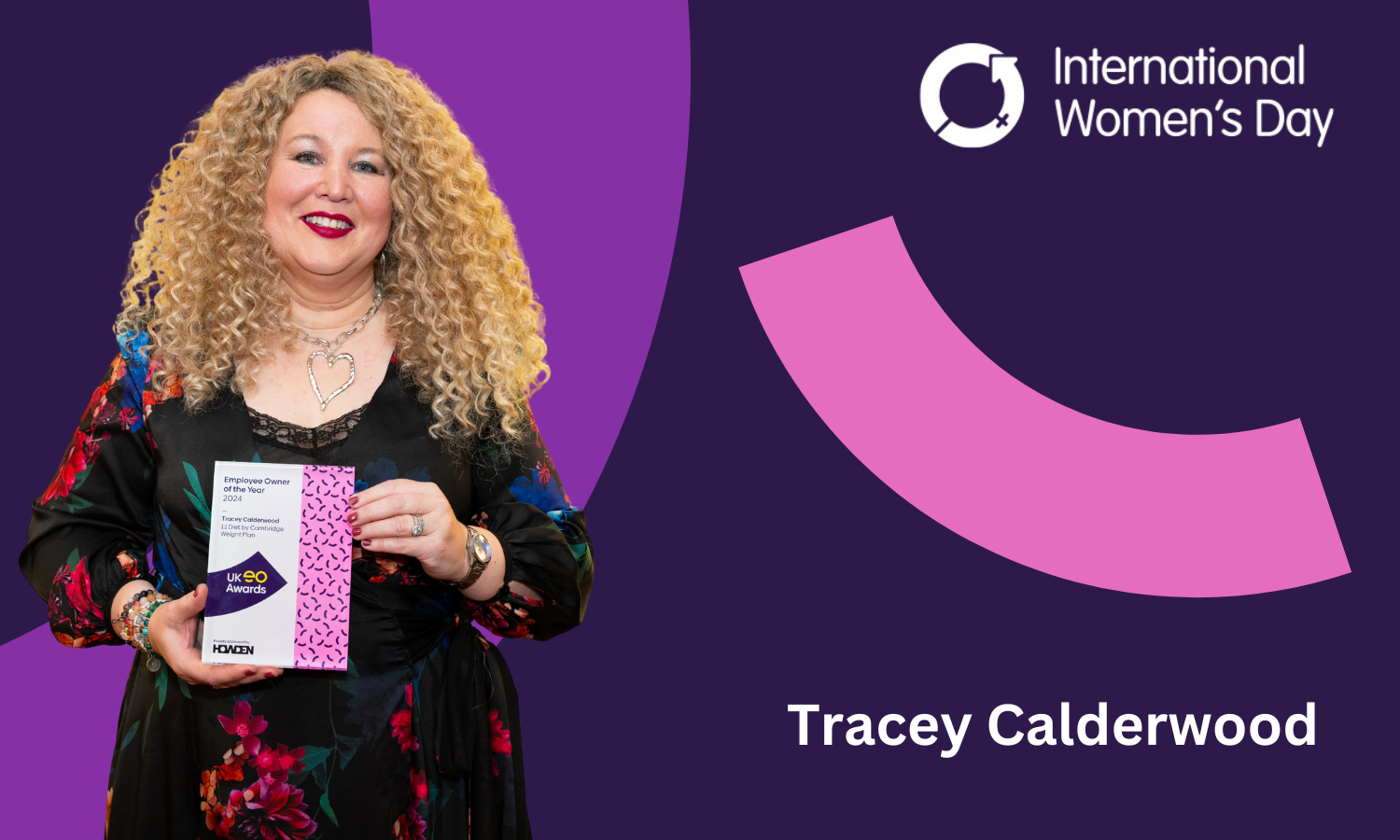 A smiling middle-aged white woman with long curly blonde hair holding a business award. She is mounted on a purple background alongside the logo for International Women’s Day and the text ‘Tracey Calderwood’